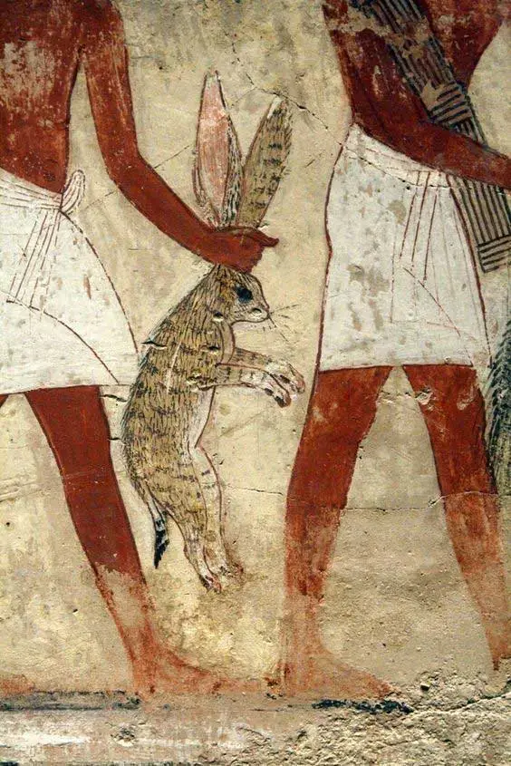 Mural en la tumba de Nebamun, Deir el-Medina en Tebas hombre tomando conejo por las orejas